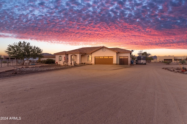 view of front of home with a garage