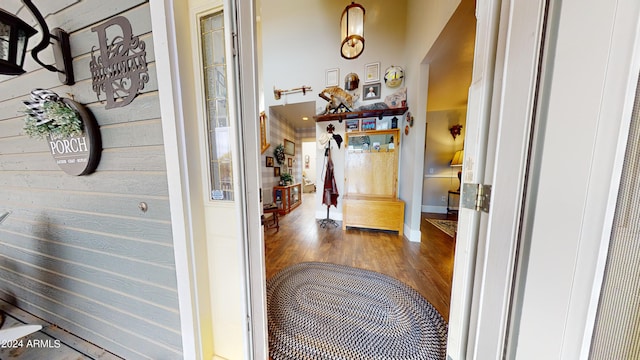 hallway with dark wood-type flooring