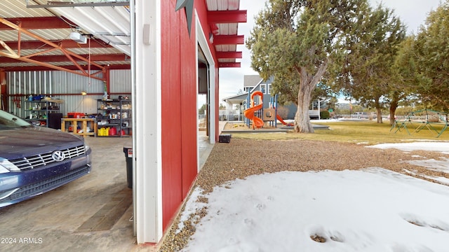 view of snow covered garage