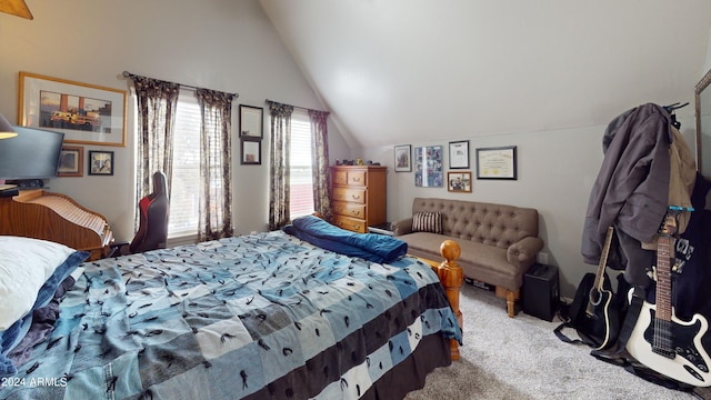 bedroom featuring vaulted ceiling and light colored carpet