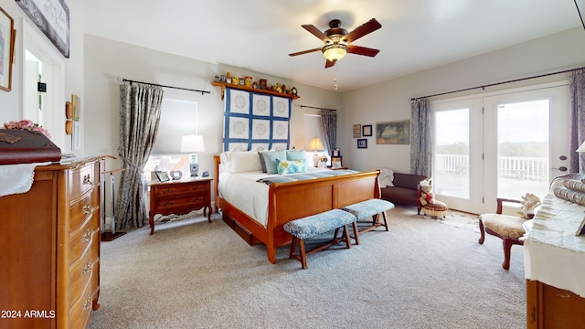 bedroom featuring ceiling fan, access to exterior, and light colored carpet