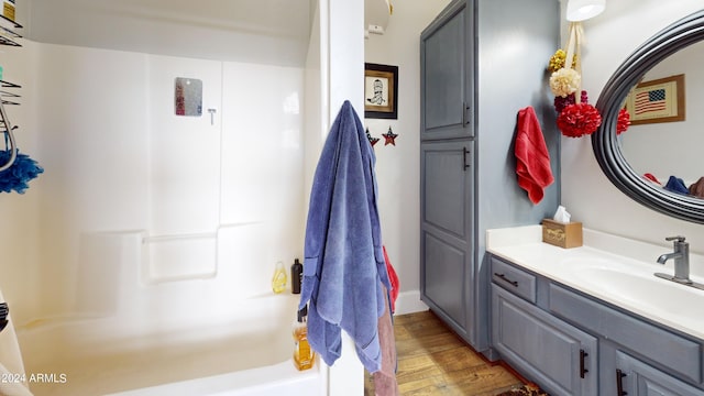 bathroom featuring vanity and hardwood / wood-style flooring