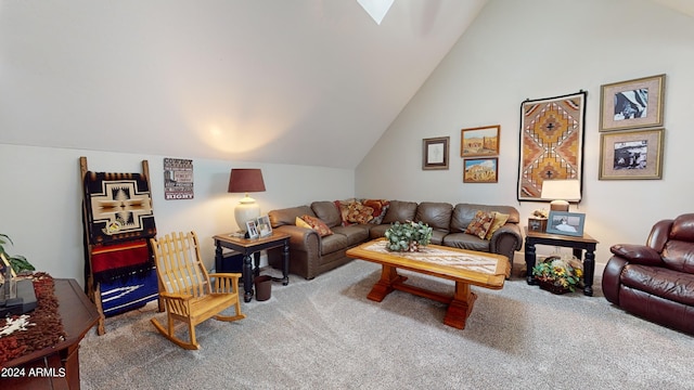 living room featuring carpet flooring and lofted ceiling with skylight