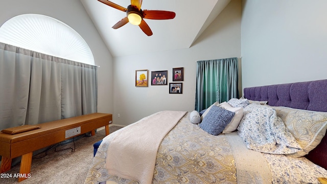 bedroom featuring ceiling fan, carpet floors, and vaulted ceiling