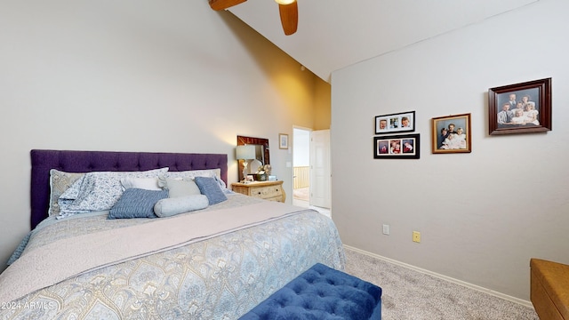 bedroom featuring ceiling fan, light colored carpet, and high vaulted ceiling