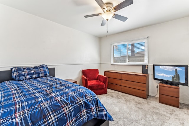 carpeted bedroom with a ceiling fan