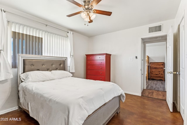 bedroom with ceiling fan, finished concrete floors, visible vents, and baseboards