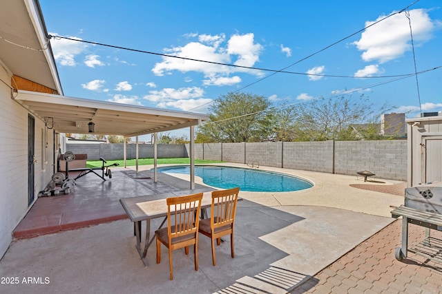 view of swimming pool featuring a fenced in pool, area for grilling, outdoor dining space, a patio area, and a fenced backyard