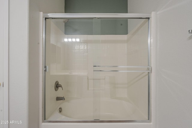 1886 E Don Carlos Ave Unit 136, Tempe, AZ 85281 - bathroom featuring shower / bath combination with glass door