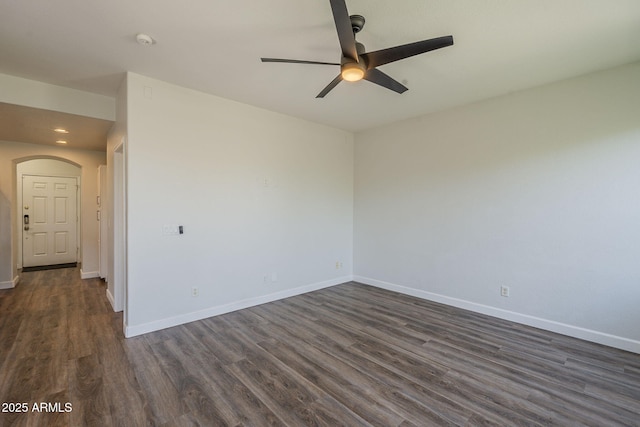 1886 E Don Carlos Ave Unit 136, Tempe, AZ 85281 - unfurnished room with a ceiling fan, dark wood-style floors, arched walkways, recessed lighting, and a smoke detector
