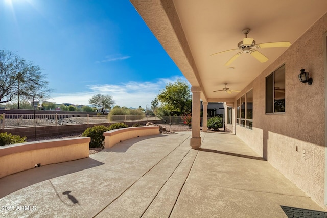 view of patio with ceiling fan