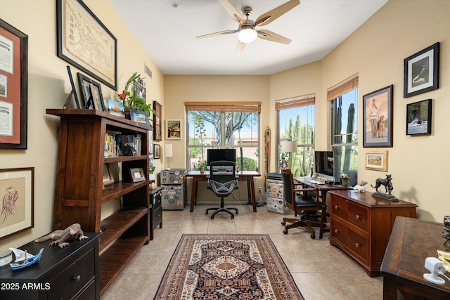 office space featuring light tile patterned flooring and a ceiling fan