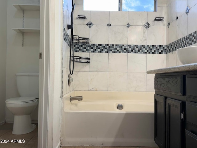 bathroom featuring tile patterned floors, toilet, and vanity