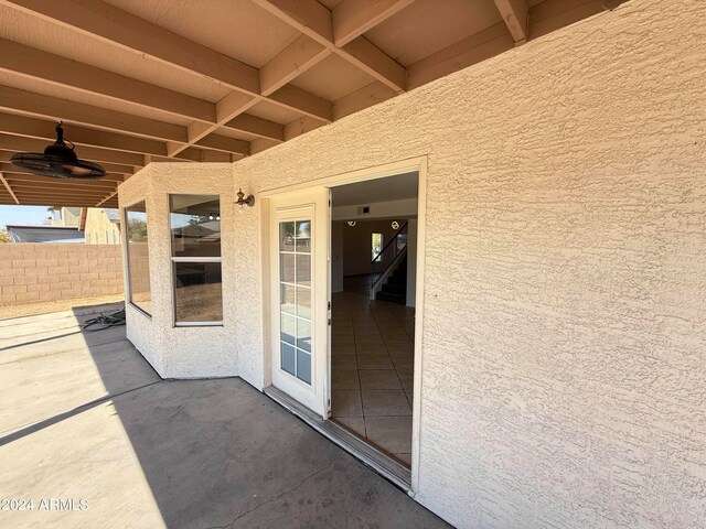 view of patio with ceiling fan