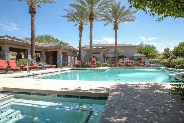 view of swimming pool featuring a patio area