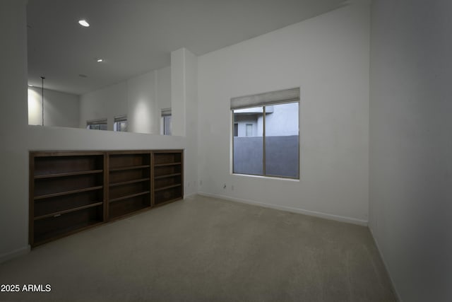 unfurnished room featuring carpet floors