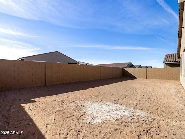 view of yard featuring a fenced backyard