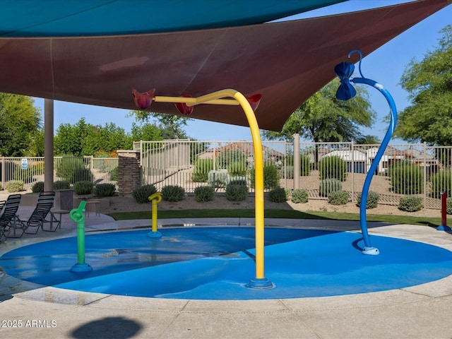 view of pool with fence