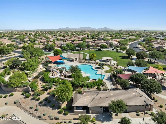 aerial view featuring a mountain view and a residential view