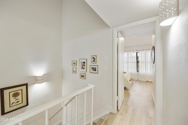 4901 E Kelton Ln Unit 1006, Scottsdale, AZ 85254 - hall featuring an upstairs landing and light wood-style floors
