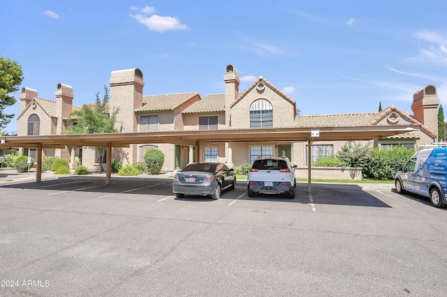 4901 E Kelton Ln Unit 1006, Scottsdale, AZ 85254 - view of property featuring covered parking