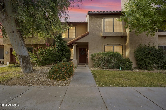 4901 E Kelton Ln Unit 1006, Scottsdale, AZ 85254 - view of front facade with stucco siding and a tile roof