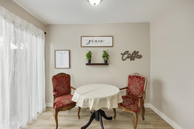 4901 E Kelton Ln Unit 1006, Scottsdale, AZ 85254 - sitting room featuring light wood-style floors and baseboards