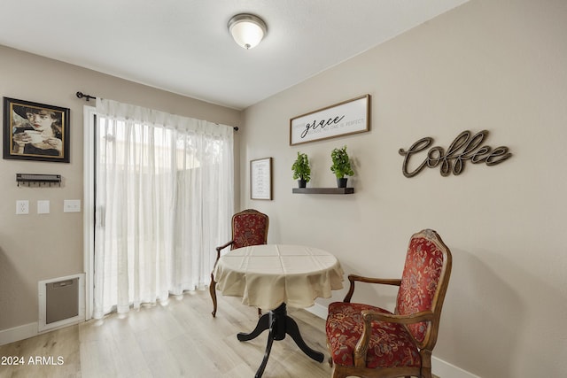 4901 E Kelton Ln Unit 1006, Scottsdale, AZ 85254 - dining area with baseboards and wood finished floors