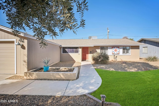 single story home with a front yard