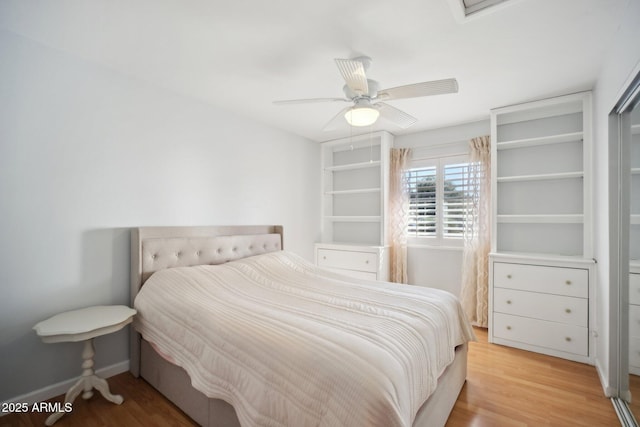 bedroom featuring ceiling fan and light hardwood / wood-style flooring