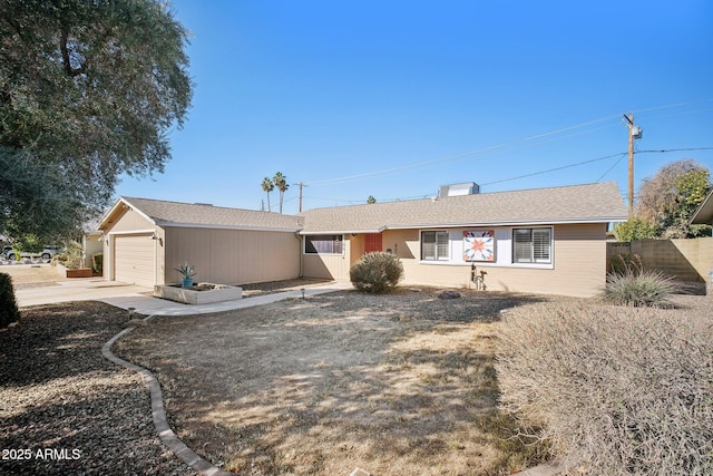 single story home with a garage