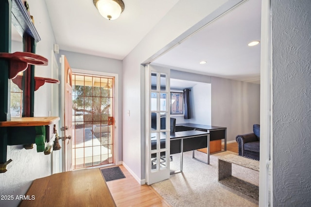 entryway with light wood-type flooring