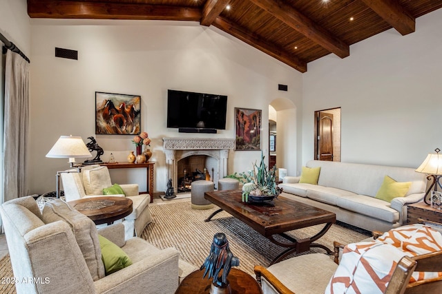 27256 N 97th Pl, Scottsdale, AZ 85262 - living room featuring a premium fireplace, beam ceiling, high vaulted ceiling, and wooden ceiling