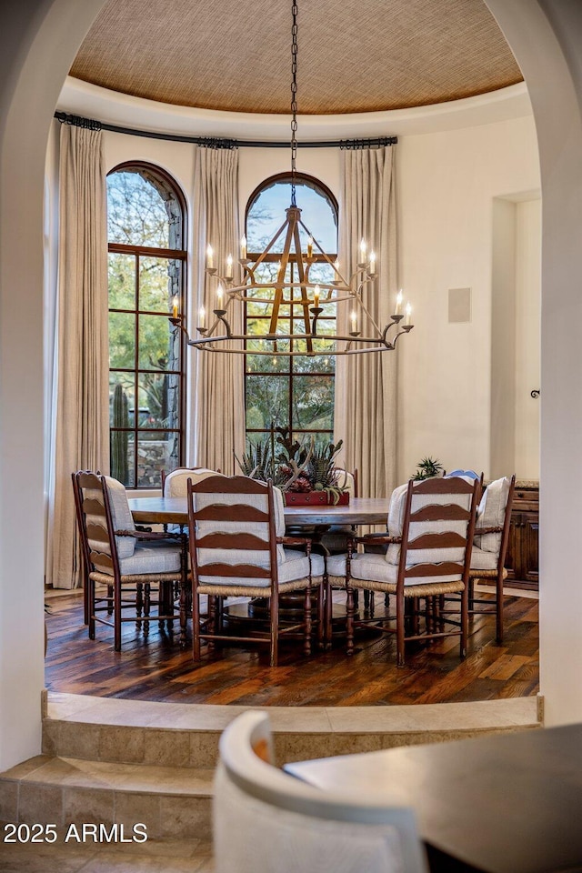 27256 N 97th Pl, Scottsdale, AZ 85262 - dining space featuring wood ceiling, wood-type flooring, and an inviting chandelier