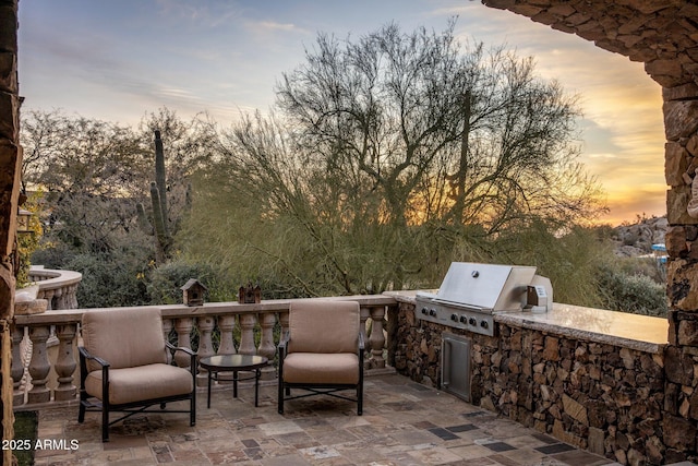 27256 N 97th Pl, Scottsdale, AZ 85262 - patio terrace at dusk featuring area for grilling and grilling area