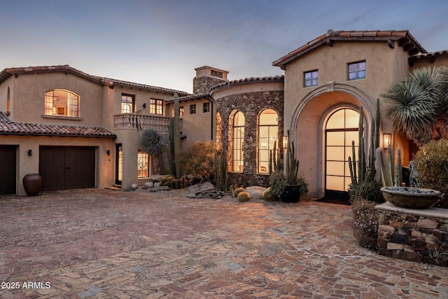 27256 N 97th Pl, Scottsdale, AZ 85262 - mediterranean / spanish house featuring a garage and a balcony