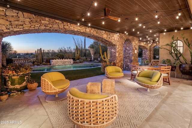 27256 N 97th Pl, Scottsdale, AZ 85262 - patio terrace at dusk with ceiling fan