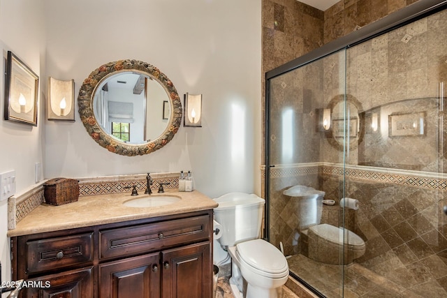 27256 N 97th Pl, Scottsdale, AZ 85262 - bathroom with vanity, a shower with shower door, and toilet