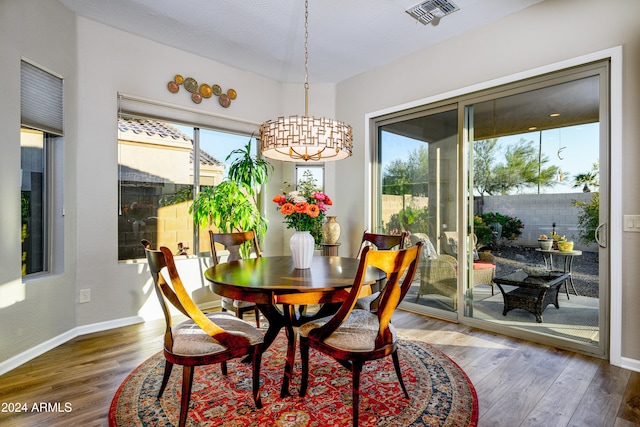 dining area featuring dark hardwood / wood-style flooring