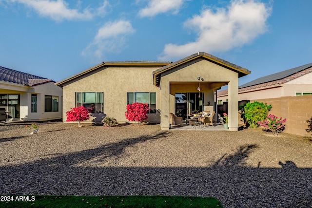 rear view of property with a patio