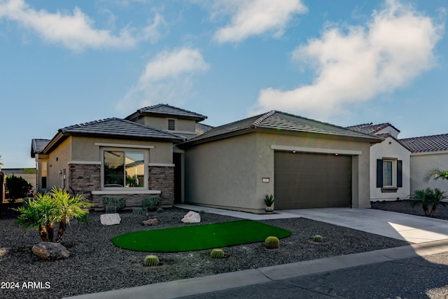 prairie-style house with a garage