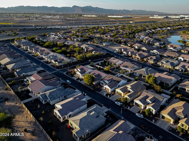 birds eye view of property with a mountain view