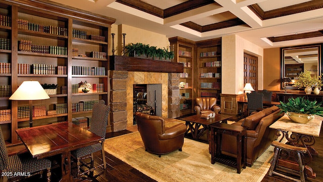 sitting room with ornamental molding, beam ceiling, light hardwood / wood-style floors, and coffered ceiling