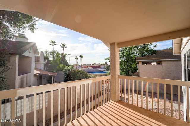 wooden deck featuring a residential view