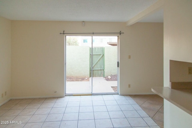 view of tiled spare room