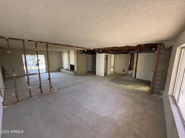 basement with a textured ceiling