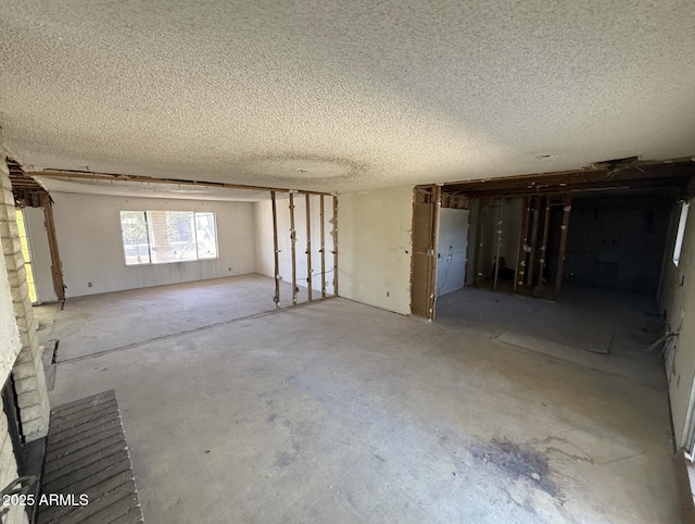 interior space with a textured ceiling