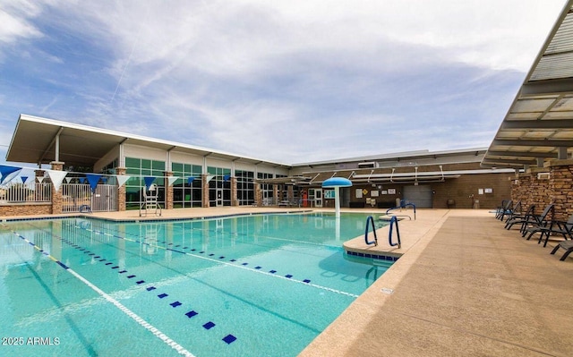 view of pool with fence