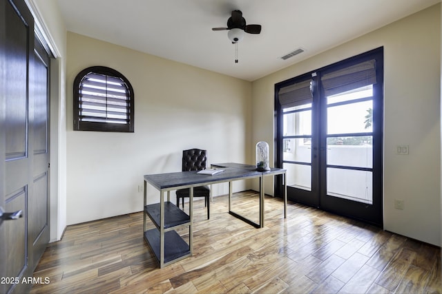 office area with french doors and ceiling fan