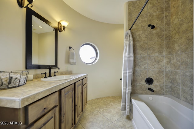 bathroom featuring tile patterned flooring, vanity, and shower / bath combination with curtain